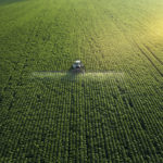 Farmland, tractor, row crops