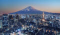 Tokyo, Japan at sunset with Mount Fuji in the background
