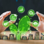 Green business concept. Bank finance money investment for sustainability, carbon credit. Green tree leaf, footprint icon, stack of coins, seedling growing on top. ESG, co2 green tax, fund, trading