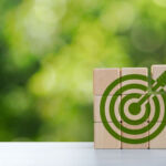 Take targeted action when managing nature risk, says Norway’s NBIM Environmental goals of green business Business development strategy with sustainable environmental conservation wooden block on handle With a green target icon. copy space