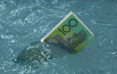 Australian money falling finance crisis sinking sea water